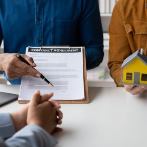 Close up view of professional real estate agent giving legal advice, selling insurance and real esta