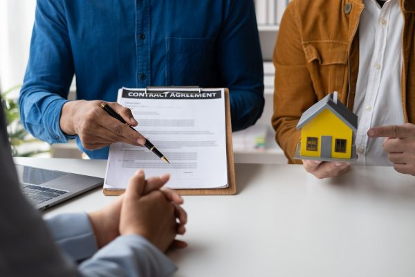 Close up view of professional real estate agent giving legal advice, selling insurance and real esta