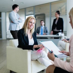 Picture of attractive saleswoman working in office